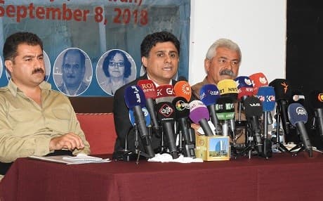 KDP-I deputy Secretary-General Asso Hassan Zadeh, is flanked by Karo Rasuli, head of security committee and Khalid Wanawsha, a KDP-I military deputy and member of the Leadership Council in Erbil, Kurdistan Region on September 12, 2018. Photo by author