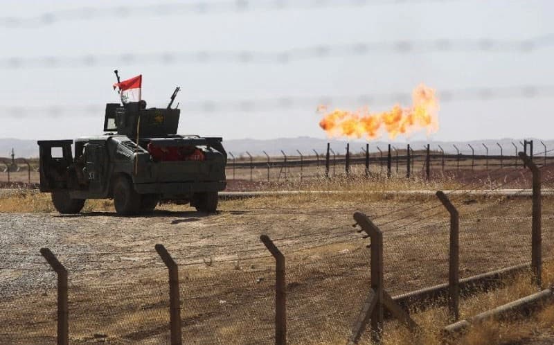 An Iraqi army vehicle parked at Kirkuk’s Bai Hassan oil field on October 17, 2018 when federal forces took control of the disputed province. Photo: Ahmad al-Rubaye/AFP