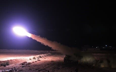 Iraqi paramilitary units from the Hashed al-Shaabi fire rockets from al-Qaim towards ISIS through the Iraqi-Syrian border near Deir ez-Zor on November 11, 2018. Photo: Ahmad al-Rubaye | AFP