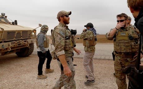 SDF and US soldiers patrolled near the Rojava border with Turkey on November 4, 2018 after Turkish shelling of Kurdish villages. Photo: Delil Souleiman/AFP
