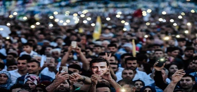 Supporters of imprisoned Selahattin Demirtas, then presidential candidate of People's Democratic Party (HDP), hold party flags in Istanbul on June 17, 2018. Photo: Yasin Akgul | AFP