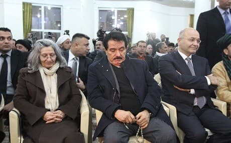 The widow of PUK co-founder Jalal Talabani, Hero Ibrahim (left), acting PUK leader Kosrat Rasul (center), and Iraqi President Barham Salih sit at an event. File photo: Rudaw.