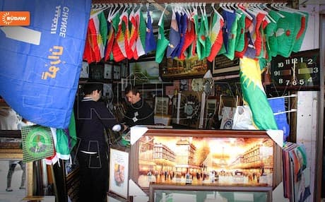 A shop sells party banners and memorabilia for the April 30 polls in Sulaimani. Photo: Rudaw