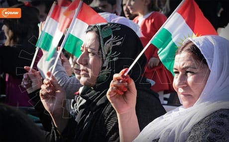 Syrian Kurdish women wave Kurdish flags. Photo: Rudaw