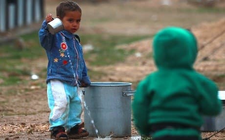 Displaced Syrian children play at the Internally Displaced Persons (IDP) camp of al-Hol in al-Hasakeh governorate in northeastern Syria on December 17, 2018. Photo: Delil Souleiman/AFP