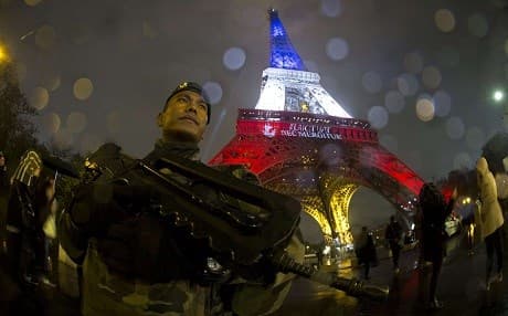 The Eiffel tower lit up with the French tricolour and motto of Paris - fluctuat nec mergitur – ‘meaning she is tossed by the waves but doesn’t sink,’ in tribute to victims of the November 13, 2015 terror attacks. File photo: Joel Saget/AFP/Getty Images