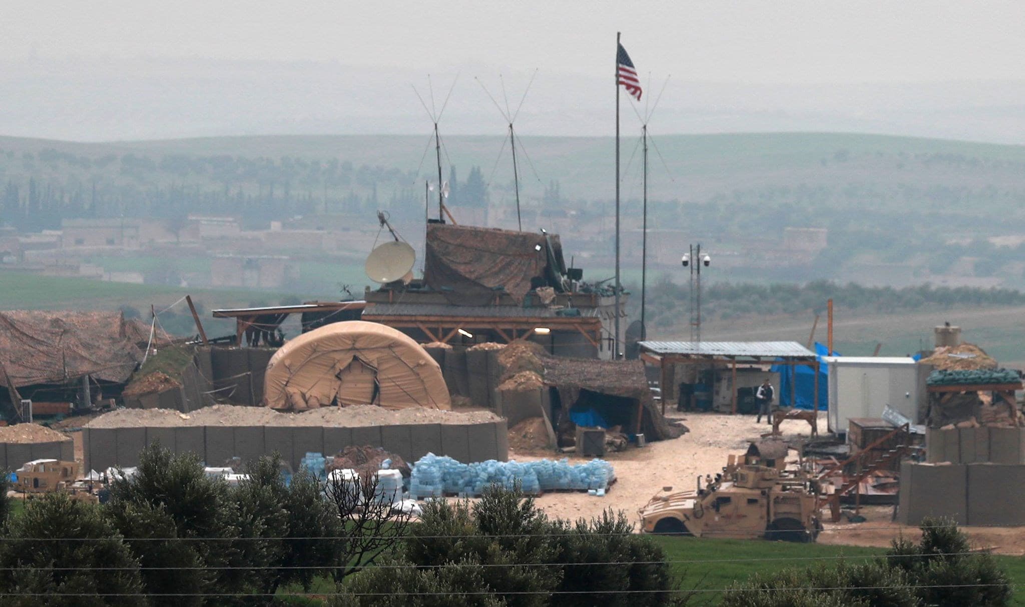 US forces' vehicles and structures are seen on the outskirts of the northern Syrian town of Manbij. Photo: Delil souleiman / AFP