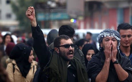 Syrian Kurds take part in a demonstration in Qamishli on December 28, 2018 against Turkish threats of a new offensive. Photo: Delil Souleiman/AFP