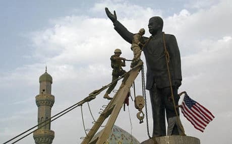 A statue of Saddam is torn down after the 2003 invasion. Photo: AFP