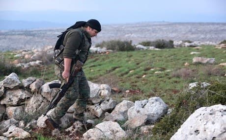 A Syrian Kurdish fighter walks in the town of Rajo in the Afrin District on January 27, 2018. File photo: AFP | stringer
