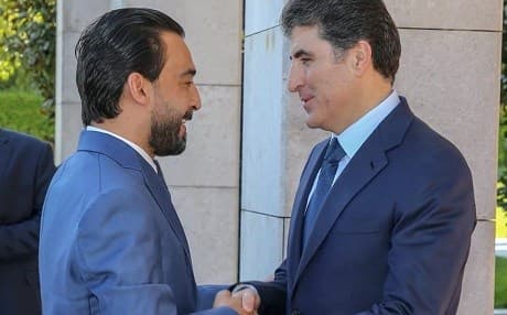 Iraqi Parliament Speaker Mohammed al-Halbousi (left) and Kurdistan Regional Government (KRG) Prime Minister Nechirvan Barzani (right) shake hands ahead of a meeting in Erbil on April 23, 2019. Photo: handout/KRG