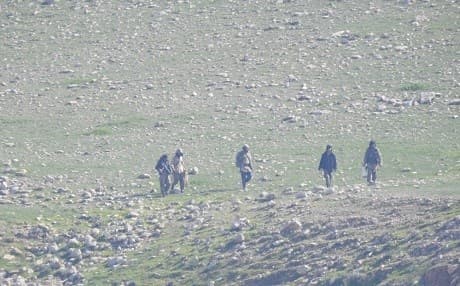 Photographs, like this one taken on February 21, 2019 by a villager, show armed men freely walking around the Makhmour area in broad daylight. Photo: Submitted