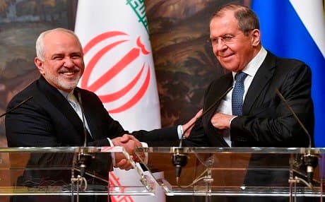 Russian FM Sergey Lavrov (right) and his Iranian counterpart Mohammad Javad Zarif shake hands at the end of a joint press conference following talks in Moscow on May 8, 2019. Photo: Alexander Nemenov