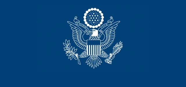 The seal of the United States Department of State.