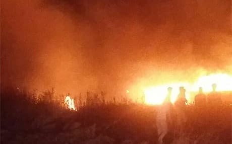 A field fire in Kirkuk province burns crops late on May 25, 2019. Photo: Submitted to Rudaw