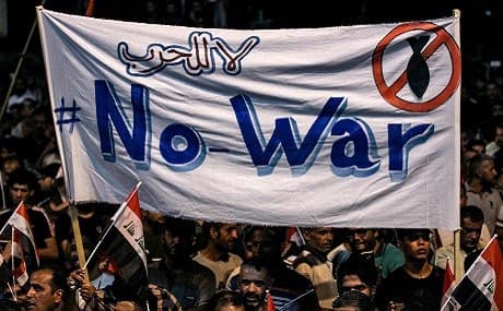 Iraqi followers of Shiite cleric Muqtada al-Sadr protest in the capital Baghdad’s central Tahrir Square against involvement in any US-Iran conflict, May 24, 2019. Photo: Ahmad al-Rubaye / AFP