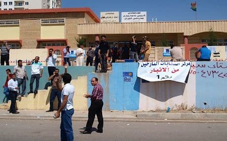 Their anger with the Iraqi Prime Minister Nuri al-Maliki and his Shiite government had driven many refugees to Andazyiaran School to fight him back with their ballots. Photo by Judit Neurink
