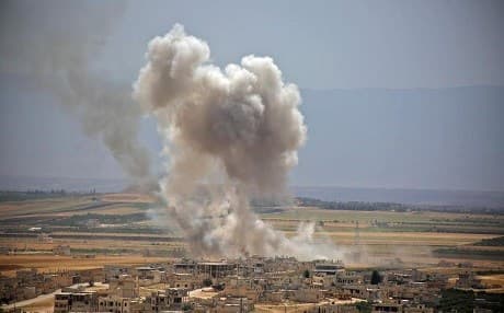 Plumes of smoke over Khan Sheikhoun, southern Idlib on June 6, 2019. Photo: AFP