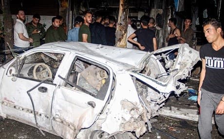 A handout picture released by the official Syrian Arab News Agency (SANA) on July 22, 2019 shows the aftermath of rocket and shelling bombardment in a residential neighbourhood in the northern Syrian city of Aleppo. Photo: SANA/AFP