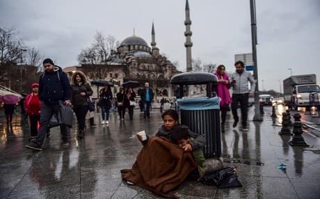 A young Syrian girl begs on the streets of Istanbul. Photo: AFP