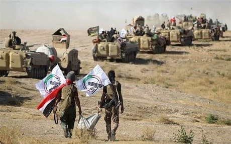 Members of the Popular Mobilization Forces (PMF), also known as Hashd al-Shaabi, in Tel Afar, Iraq on August 22, 2017. Photo: AFP