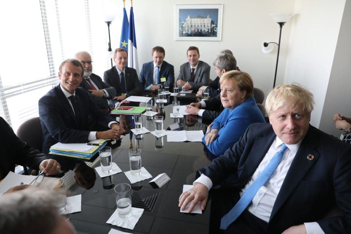  French President Emmanuel Macron (left) meets with German Chancellor Angela Merkel (second to right) and British Prime Minister Boris Johnson (right) at the United Nations headquarters in New York on September 23, 2019. Photo: Ludovic Manin / AFP