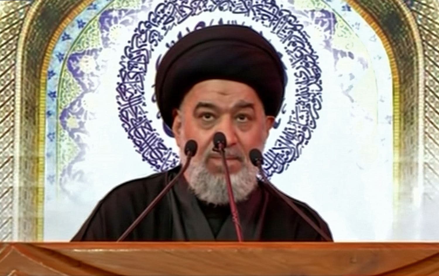 Ahmad Al-Safi, a representative of Iraq's Shiite spiritual leader, reads a statement by Grand Ayatollah Ali Sistani in the central shrine city of Karbala, October 4, 2019. Photo: Iraqiya TV / HO / AFP 