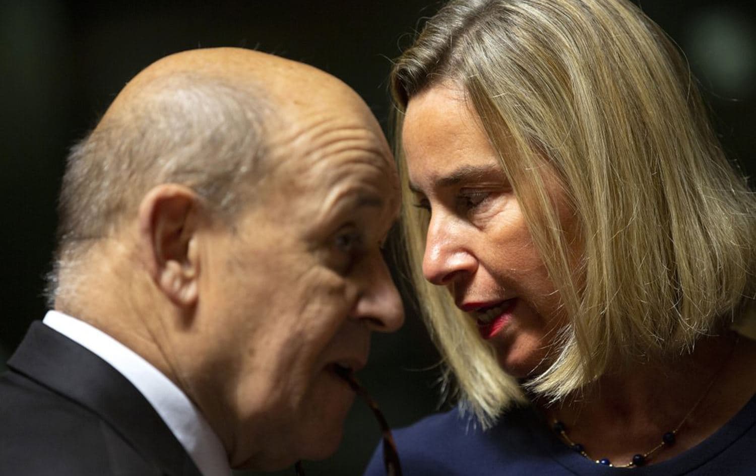 European Union foreign policy chief Federica Mogherini, right, speaks with French Foreign Minister Jean-Yves Le Drian during a meeting of EU foreign ministers at the European Convention Center in Luxembourg, October 14, 2019. Photo: Virginia Mayo / AP