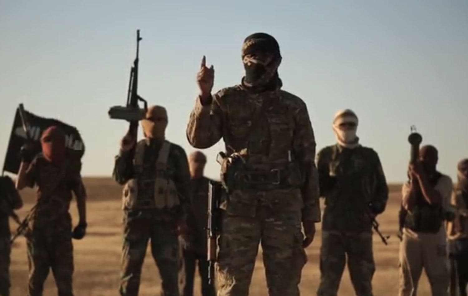 A group of ISIS militants in the border area between Iraq and Syria threatening to rise up again, in video published by ISIS in September 2019.