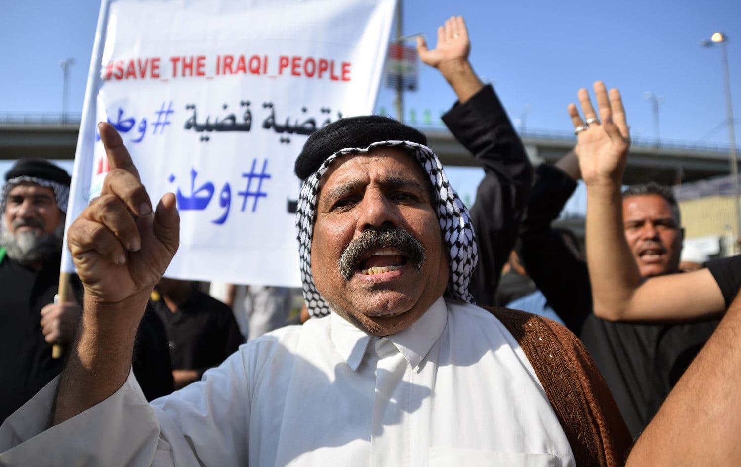 Iraqi protestors take part in anti-government demonstrations in the central city of Najaf on October 25, 2019. Photo: Haidar Hamdani/AFP