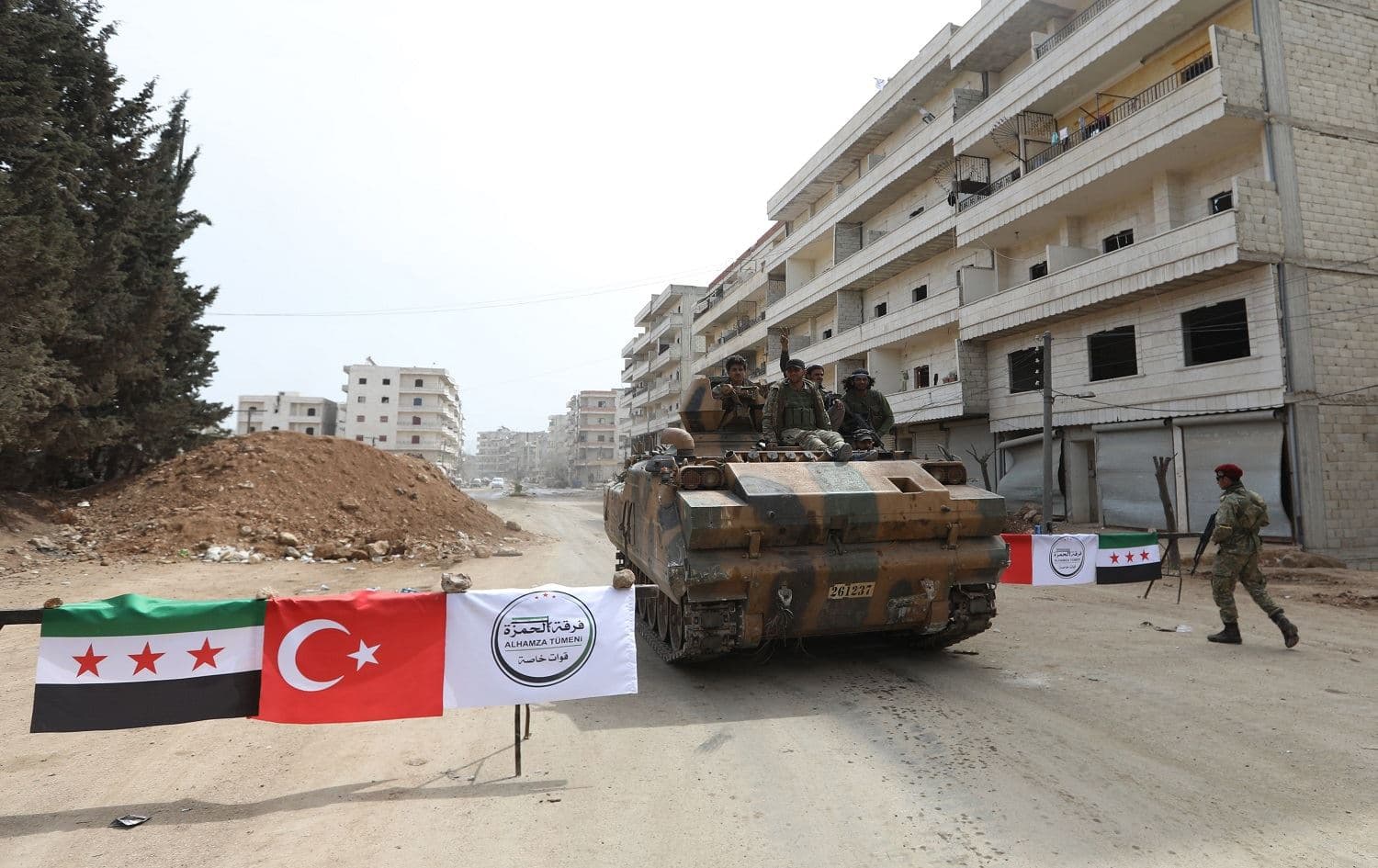Turkish-backed fighters man a checkpoint in the northwest Syrian town of Afrin in March 2018. File photo: AFP