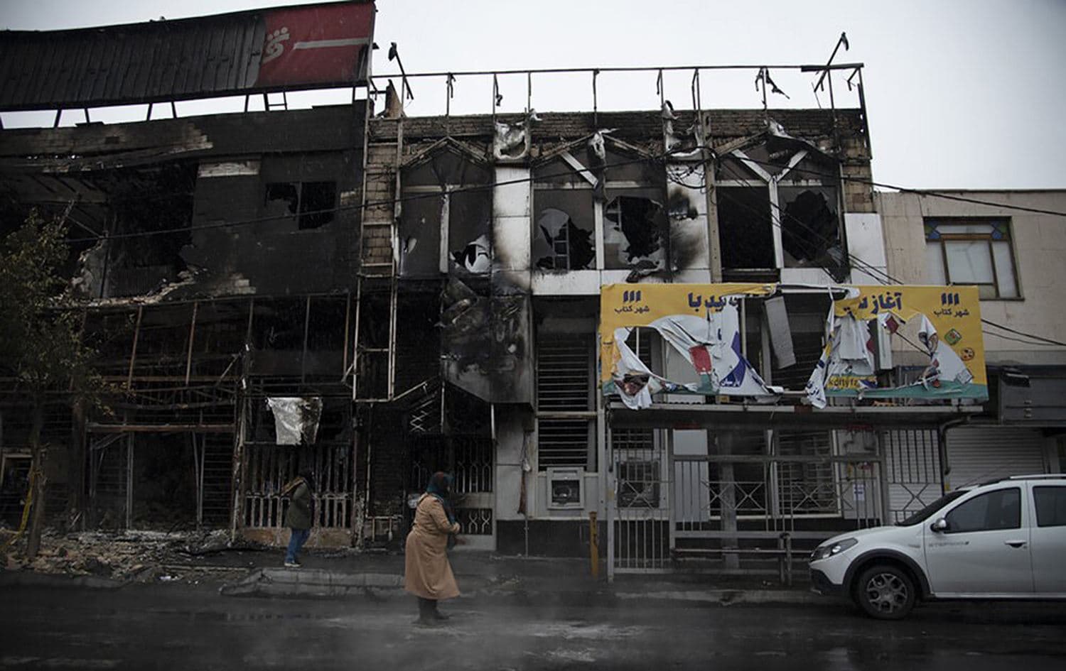 Burned out buildings in the city of Karaj, west of the capital Tehran, Iran, November 18, 2019. Photo: Masoume Aliakbar / ISNA / AP