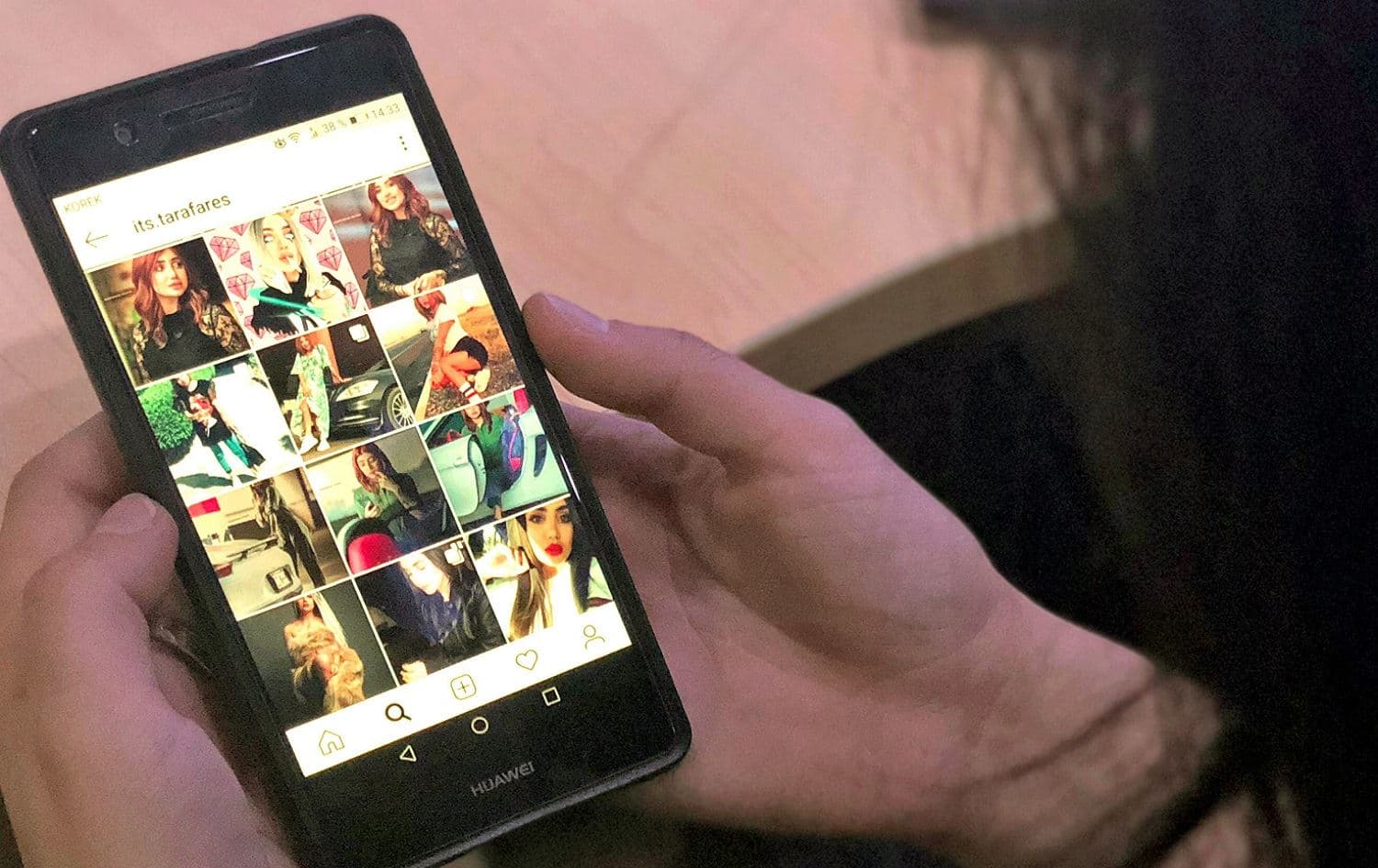 A person looks at the profile page of slain Iraqi model and Instagram starlet Tara Fares in Baghdad on September 28, 2018. File photo: AFP