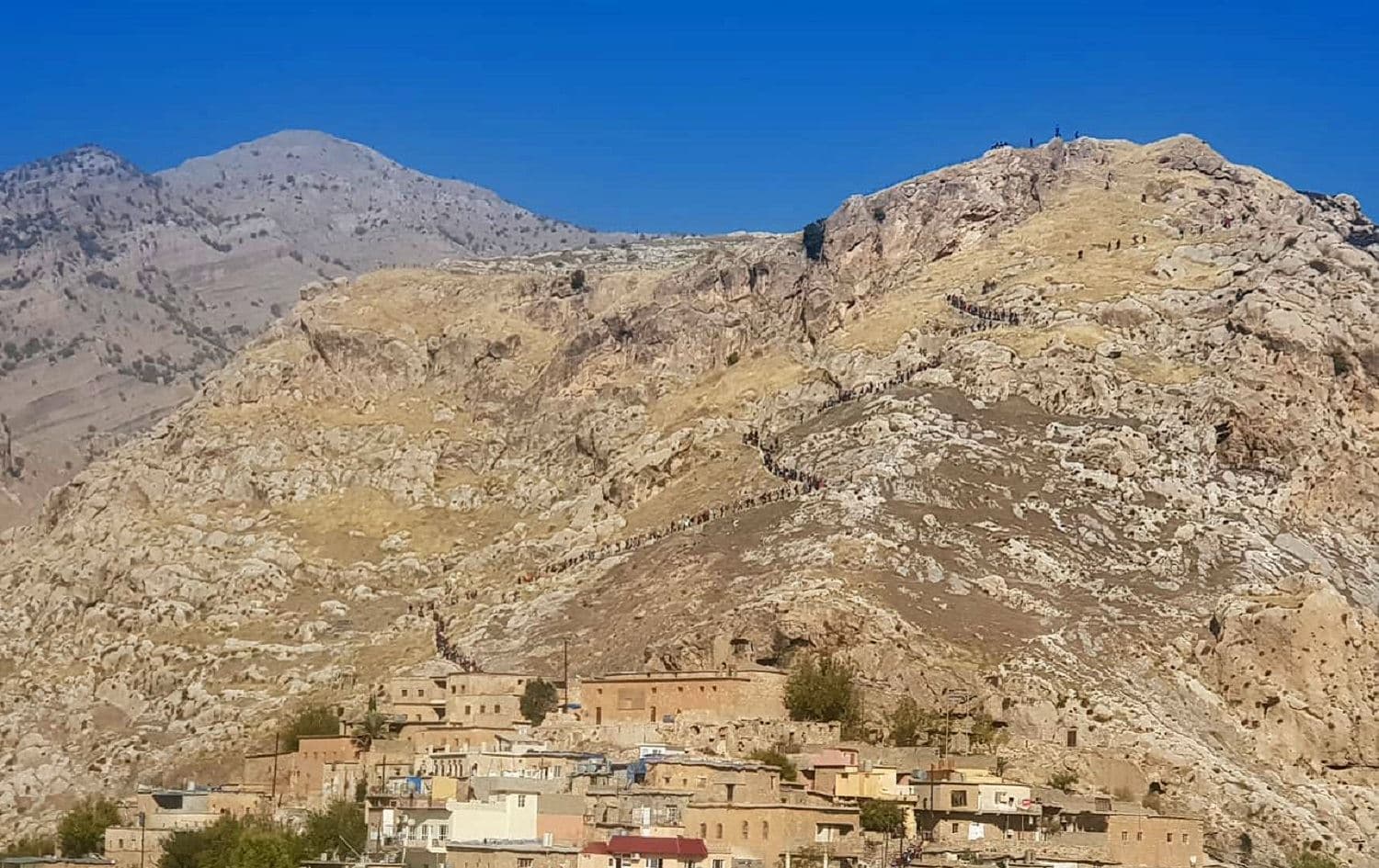 Mountaineers climb Mount Akre during the Kurdistan Annual Mountaineers Festival taking place in the ‘Newroz capital’ of Akre, Duhok Province, Kurdistan Region of Iraq, November 22, 2019. Photo: Huner Rasheed / Rudaw