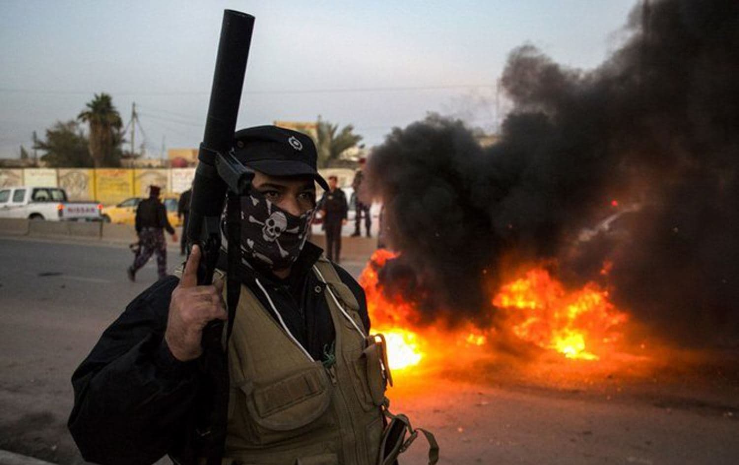 Unknown gunmen opened fire on a car carrying Dijlah TV reporter Ahmed Abdul Samad and camera operator Safaa Ghali, who were covering protests in the southern Iraqi city of Basra. (File/AFP)