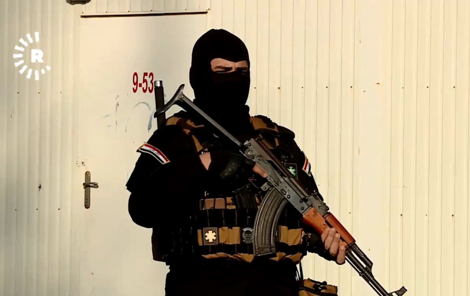 A member of the Popular Mobilization Forces (PMFs) stands guard at a paramilitia base in Nineveh, Iraq, February 6, 2020. Photo: Rudaw TV