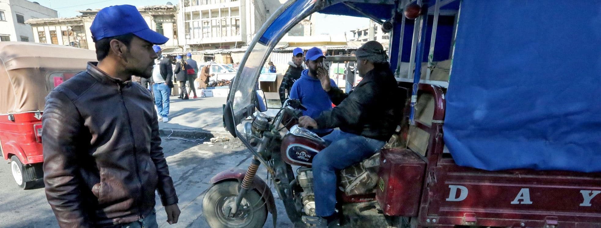 Members of the 'blue hats' at a makeshift checkpoint in Baghdad's Tahrir Square on February 4, 2020. Photo: AFP