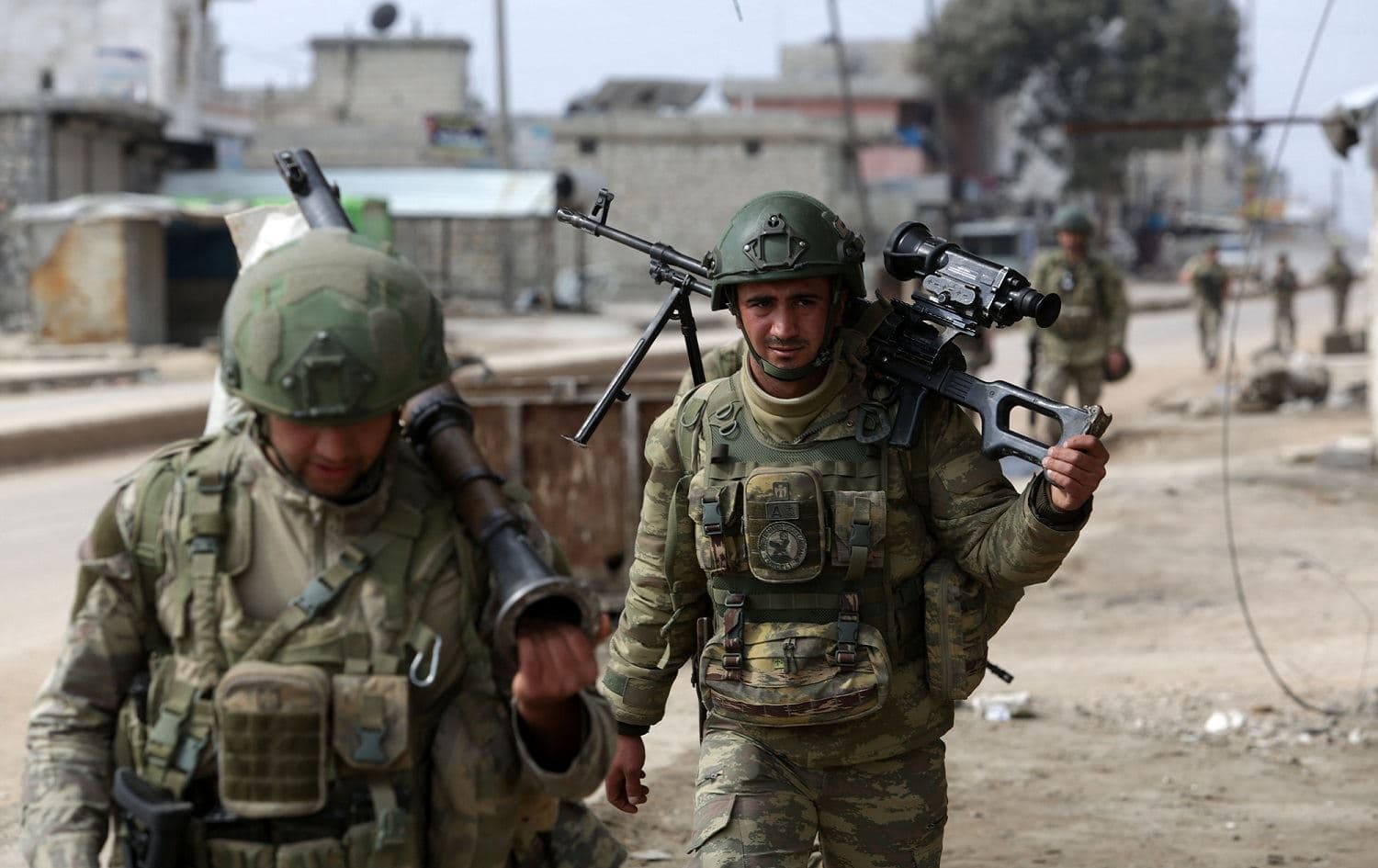 Turkish troops patrol in the town of Atareb in the rebel-held western countryside of Syria’s Aleppo province, February 19, 2020. Photo: Aref Tammawi / AFP 