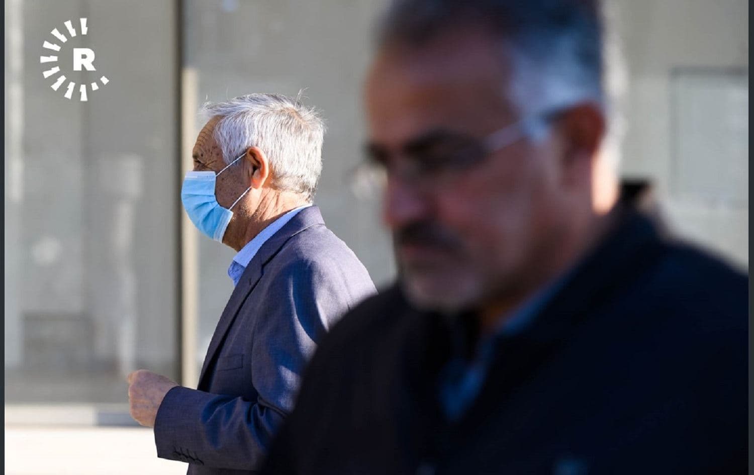 A masked man walks around Erbil on 27 February, 2020. Photo: Bilind T.Abdullah