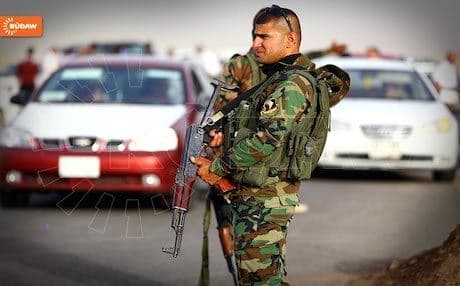 A Kurdish Special Forces soldier guards the highway connecting the Kurdistan Region and Mosul. Photo: Rudaw