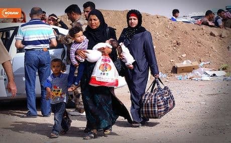Iraqi refugees fleeing from Mosul, after it was seized by insurgents, and heading to the northern Kurdistan Region. Photo: Rudaw