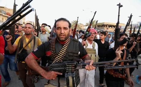 Iraqi Shiite volunteers answering the call to take up arms. Photo: AP