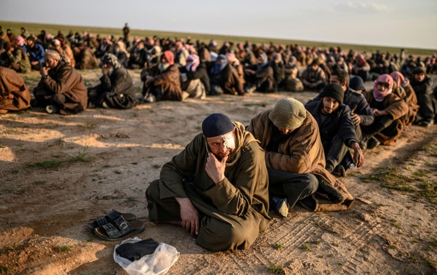 Islamic State (ISIS) militants surrender to the Kurdish-led Syrian Democratic Forces (SDF) on the outskirts of Baghouz, the jihadists’ last holdout in eastern Syria, March 2019. File photo: AFP