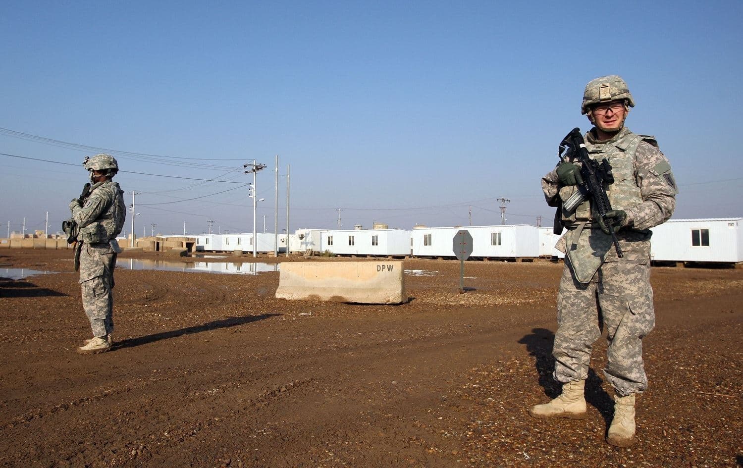 US soldiers walk around the Taji base complex. File photo: AFP