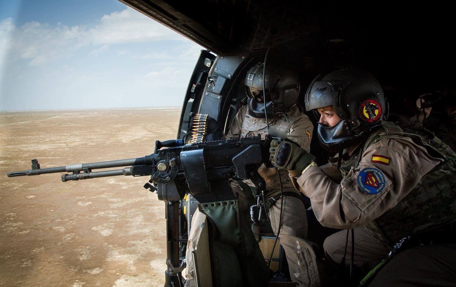 Spanish soldiers fire an FN MAG machine gun during a training exercise at the Besmaya Range Complex, Iraq, April 19, 2019. Photo: OIR