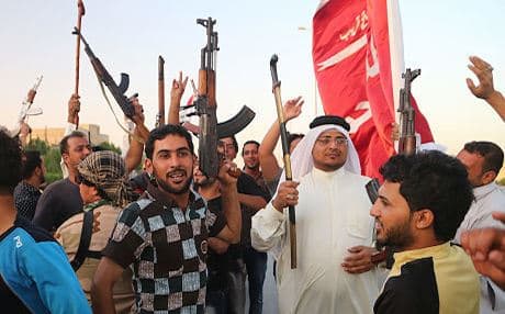 Iraqi Shiite militia answer a clerical call to fight against the Sunni militants of the Islamic State (IS). Photo: AP