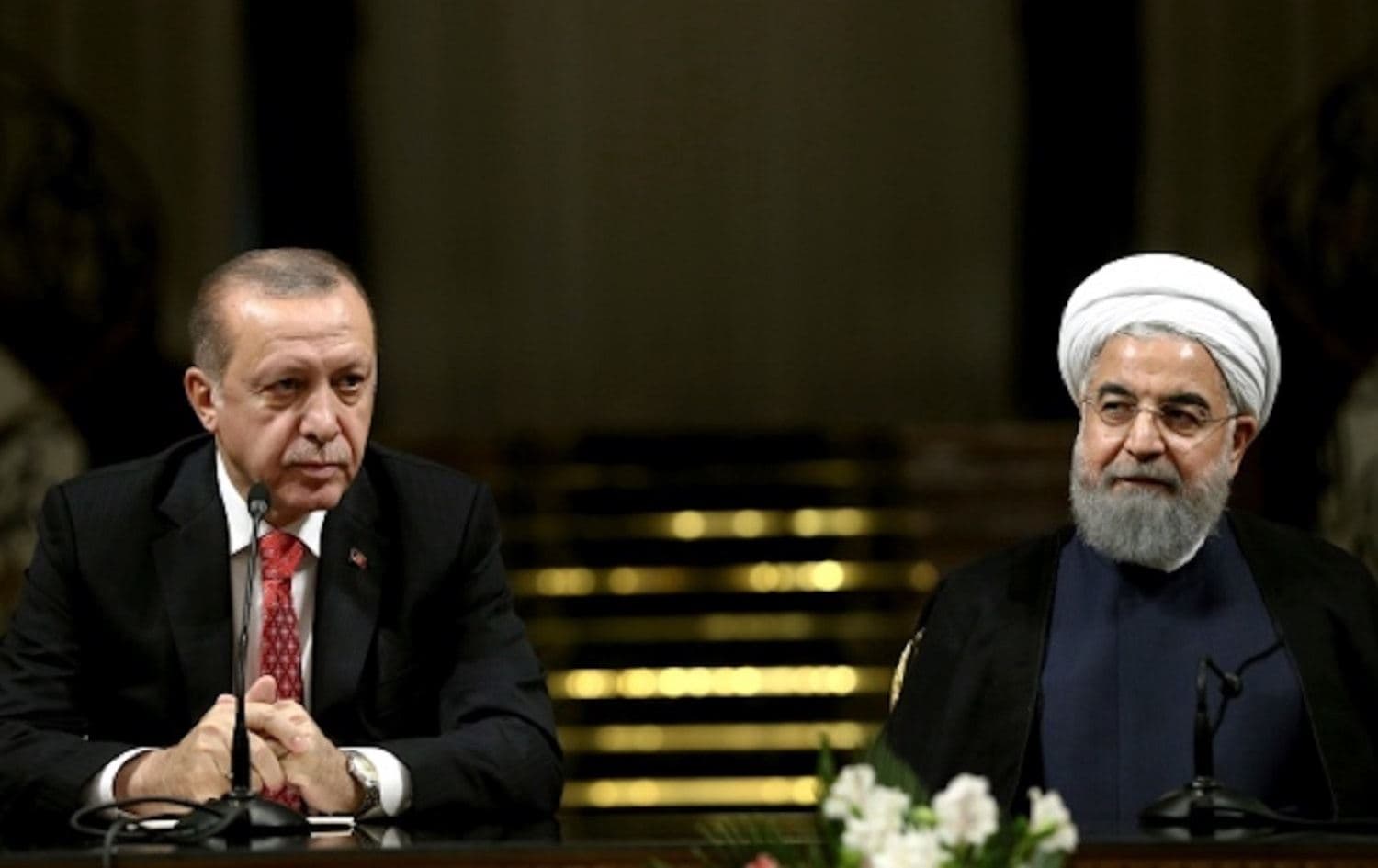 Turkish president Recep Tayyip Erdogan (left) joins his Iranian counterpart Hassan Rouhani during a press conference in Tehran, in October 2017. File photo: AP 