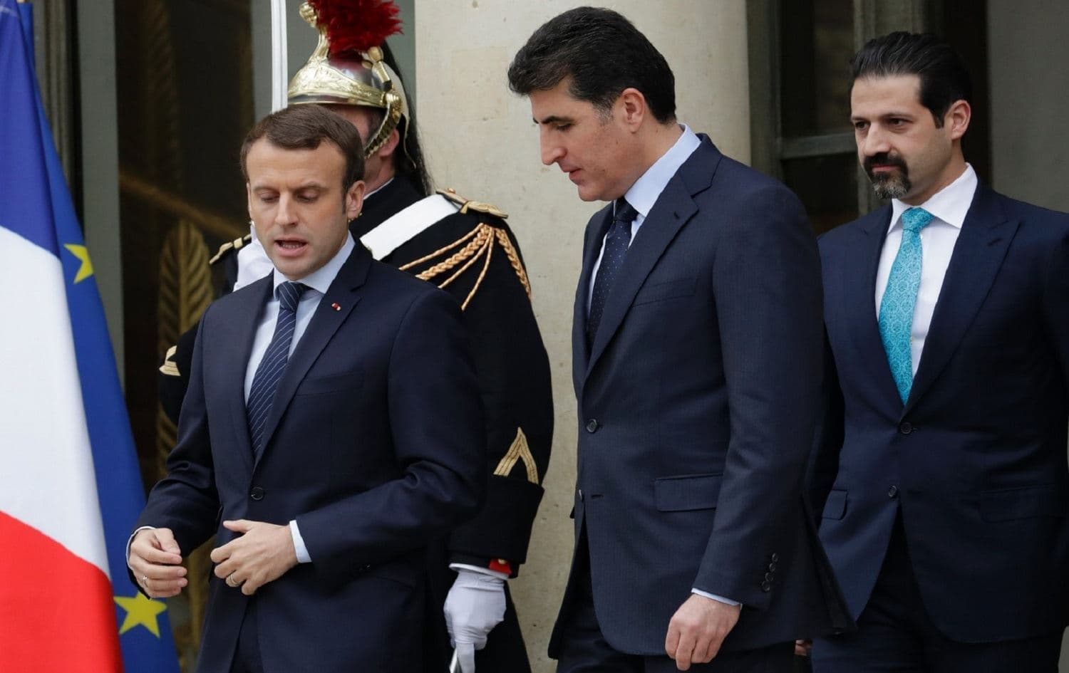 Then-KRG Prime Minister Nechirvan Barzani (center) and deputy PM Qubad Talabani (right) with French President Emmanuel Macron in Paris on December 2, 2017. File Photo: Thomas Sanson/ AFP