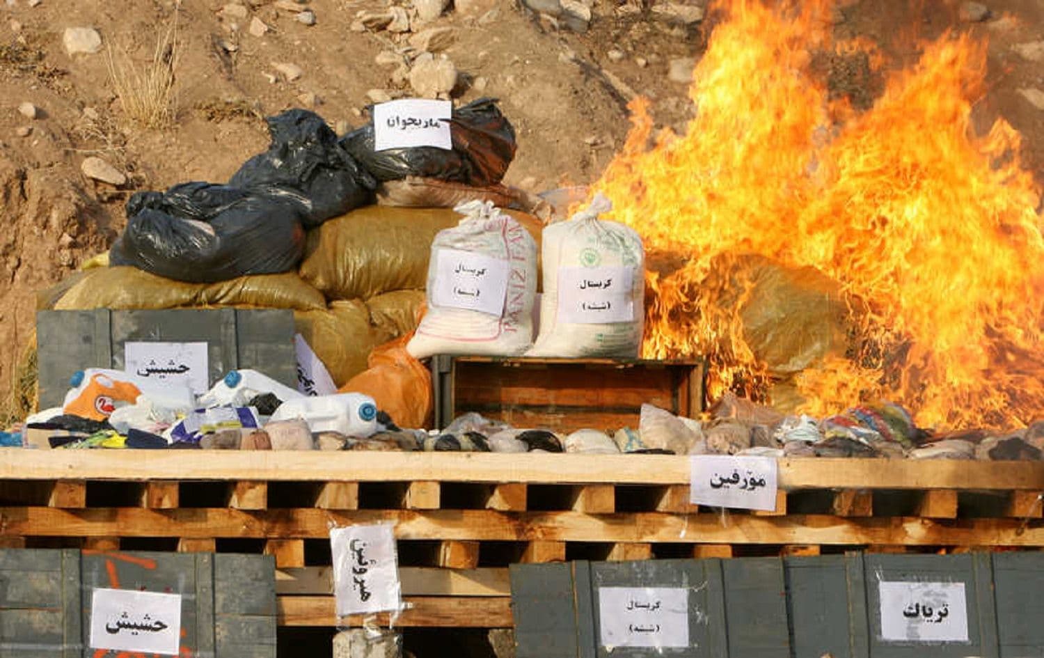 Seized drugs are incinerated by Iraqi Kurdish security forces in the northern city of Erbil, Iraq, Oct. 29, 2013. Photo: Safin Hamed /AFP
