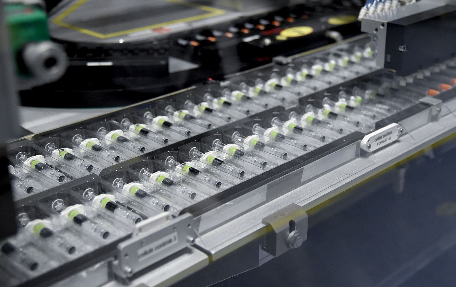 Vials on a production line at the factory of British multinational pharmaceutical company GlaxoSmithKline (GSK) in Saint-Amand-les-Eaux, northern France, on December 3, 2020. Photo: Francois Lo Presti / AFP